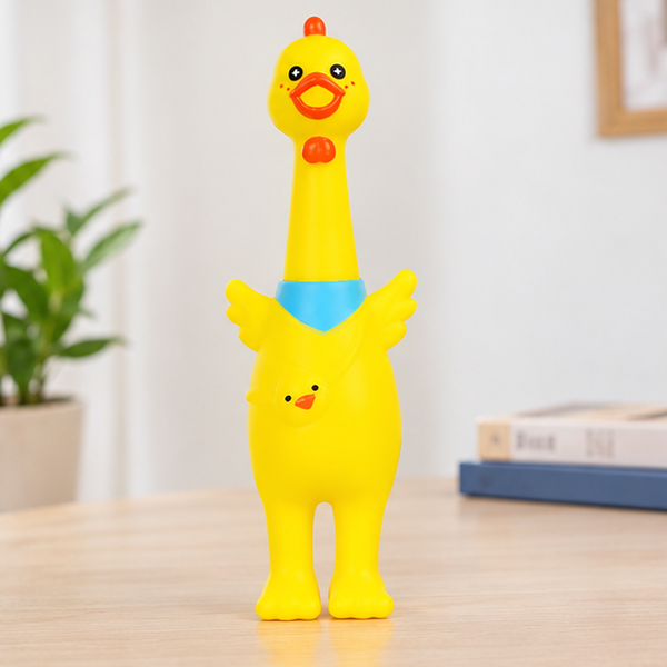 Screaming Plastic Chicken standing on a tabletop in a bright indoor setting for casual play and novelty display.